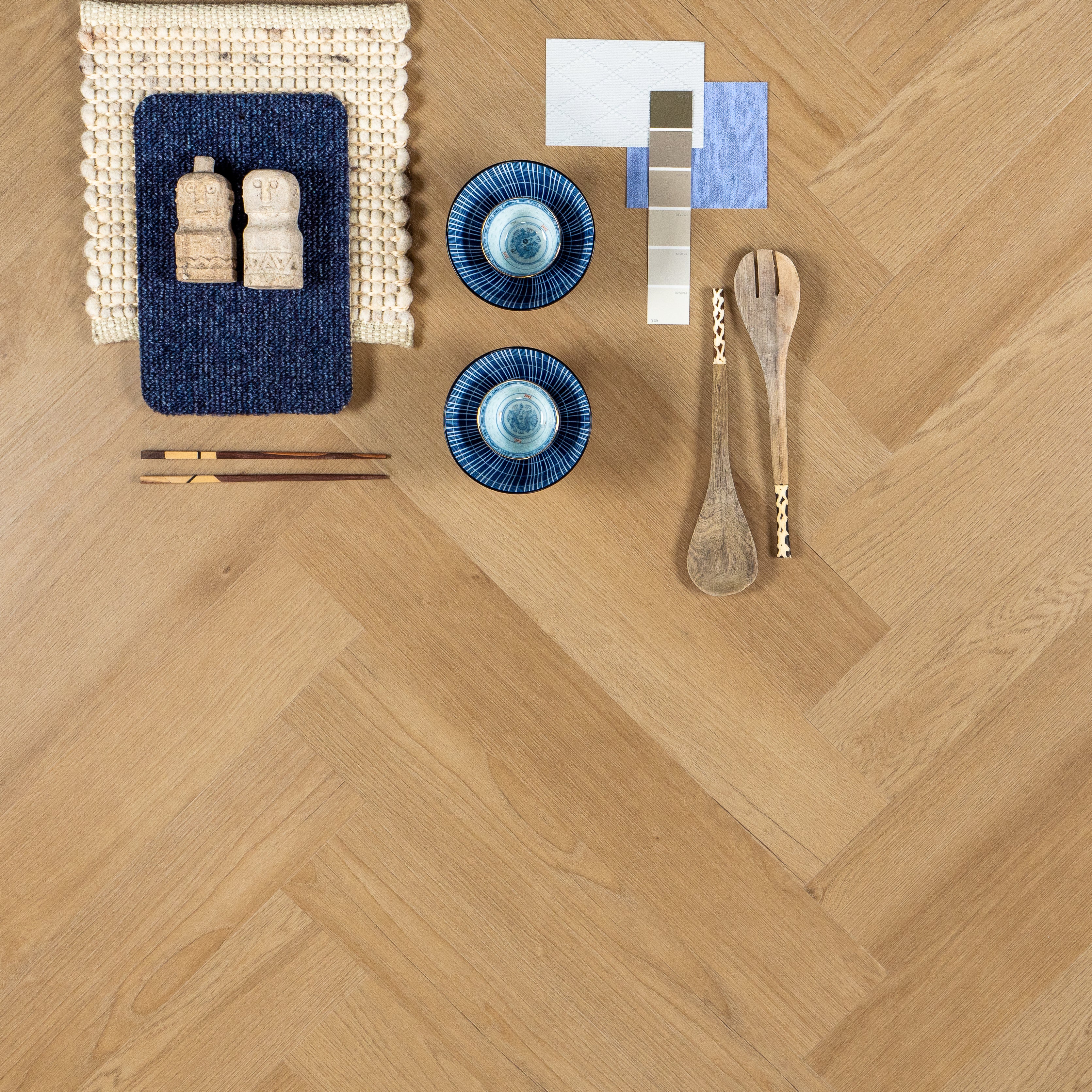 Otium Hammam Herringbone – Stijlvolle visgraat SPC vloer verkrijgbaar bij XL Woonwinkel, 100% waterbestendig, geschikt voor vloerverwarming en voorzien van een geïntegreerde ondervloer.