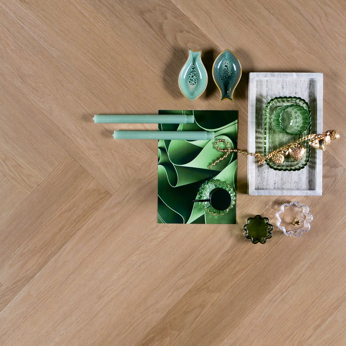 Otium Laguna Herringbone - Stijlvolle visgraat SPC vloer verkrijgbaar bij XL Woonwinkel, 100% waterbestendig, geschikt voor vloerverwarming en voorzien van een geintegreerde ondervloer.