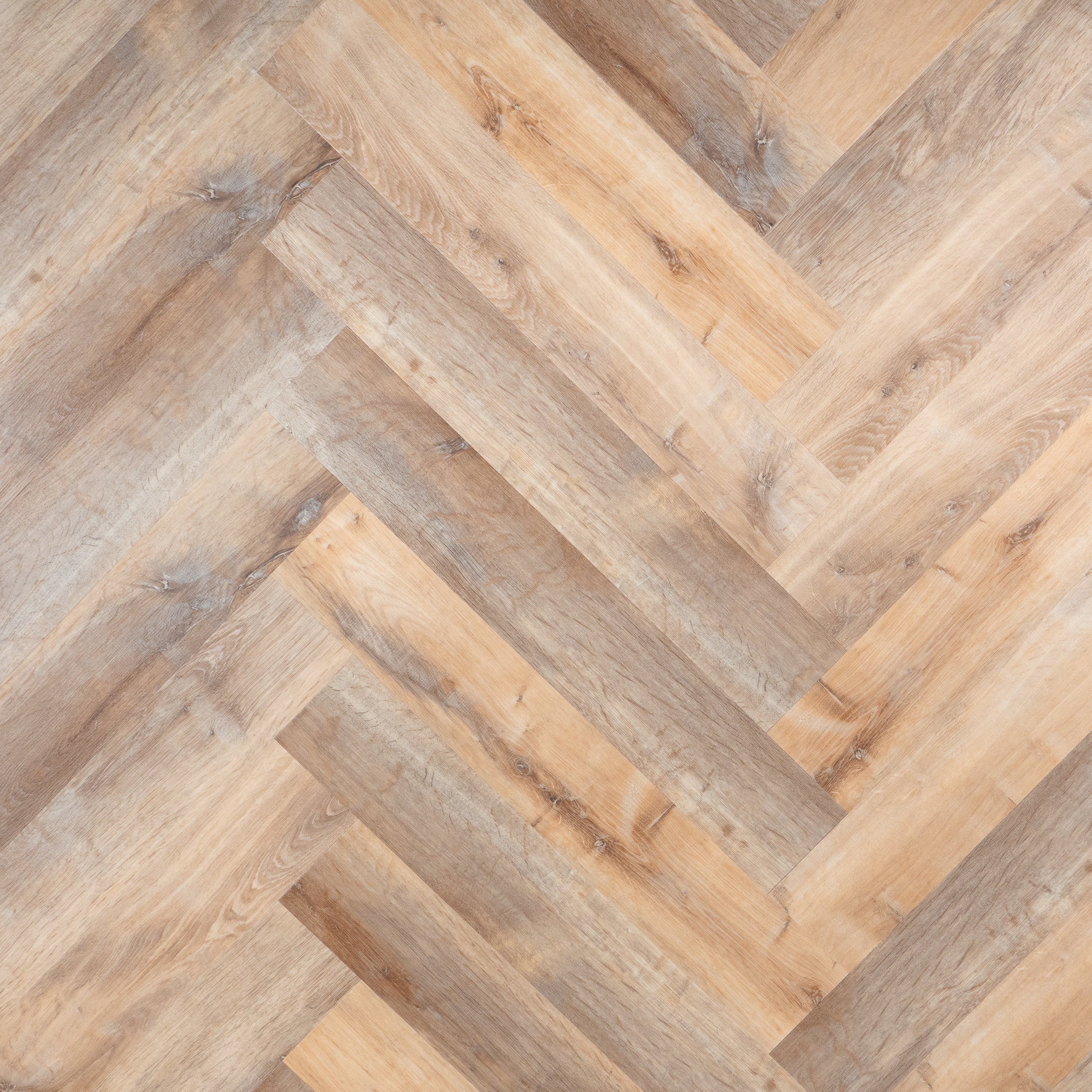 Otium Oase Herringbone – Stijlvolle visgraat SPC vloer verkrijgbaar bij XL Woonwinkel, 100% waterbestendig, geschikt voor vloerverwarming en voorzien van een geïntegreerde ondervloer.