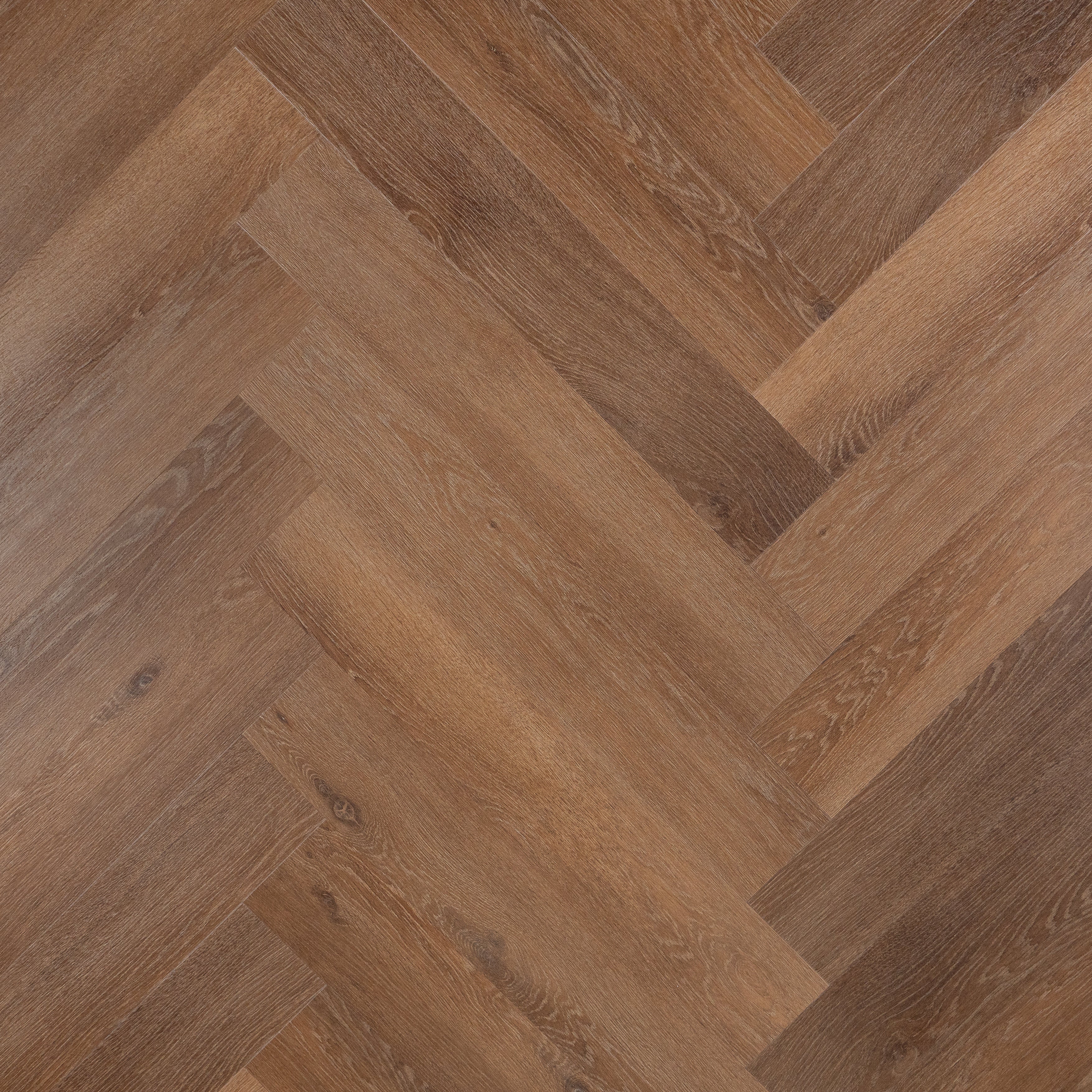 Otium Rose Herringbone – Stijlvolle visgraat SPC vloer verkrijgbaar bij XL Woonwinkel, 100% waterbestendig, geschikt voor vloerverwarming en voorzien van een geïntegreerde ondervloer.