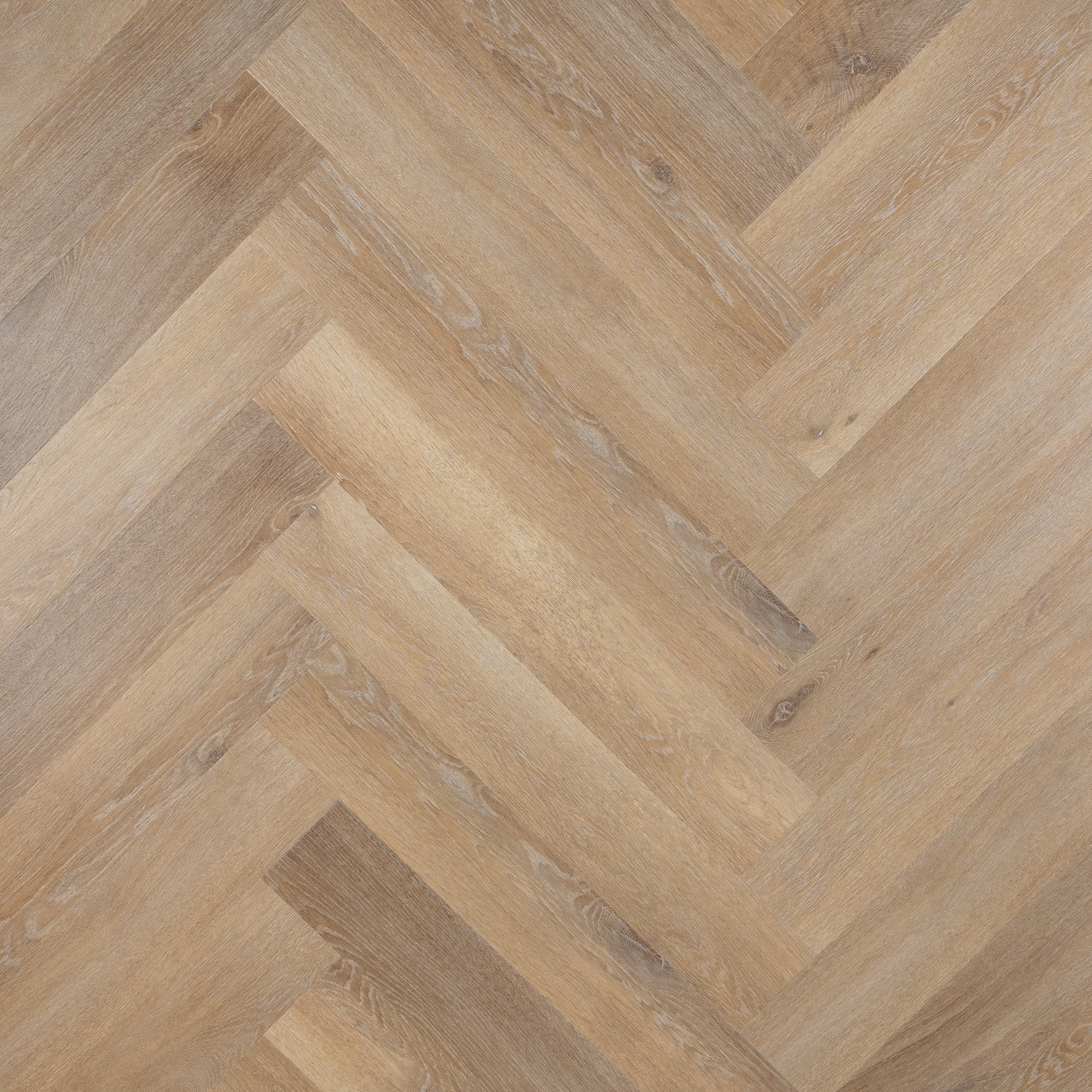 Otium Lily Herringbone – Stijlvolle visgraat SPC vloer verkrijgbaar bij XL Woonwinkel, 100% waterbestendig, geschikt voor vloerverwarming en voorzien van een geïntegreerde ondervloer.