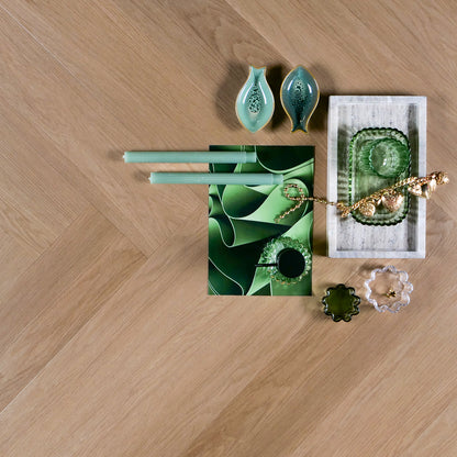 Otium Laguna Herringbone - Stijlvolle visgraat SPC vloer verkrijgbaar bij XL Woonwinkel, 100% waterbestendig, geschikt voor vloerverwarming en voorzien van een geintegreerde ondervloer.